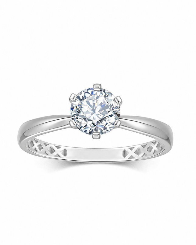 Eterna round-cut moissanite solitaire ring on a pure white background